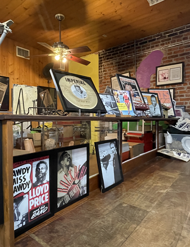 Records and music posters on display in the former home of J&M Records in New Orleans